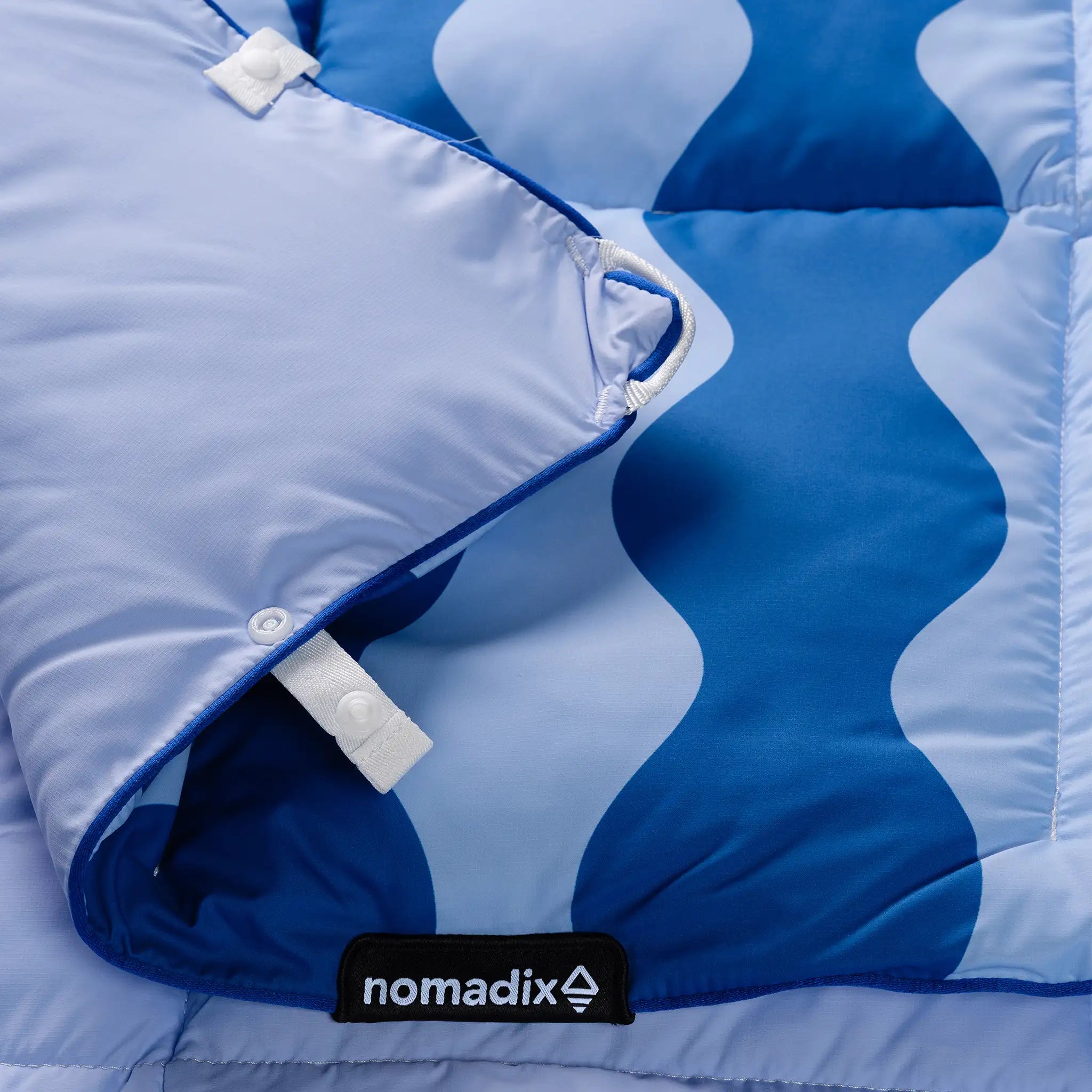 Nomadix | Graphene Puffer Blanket: Slack Tide Coastal Blue