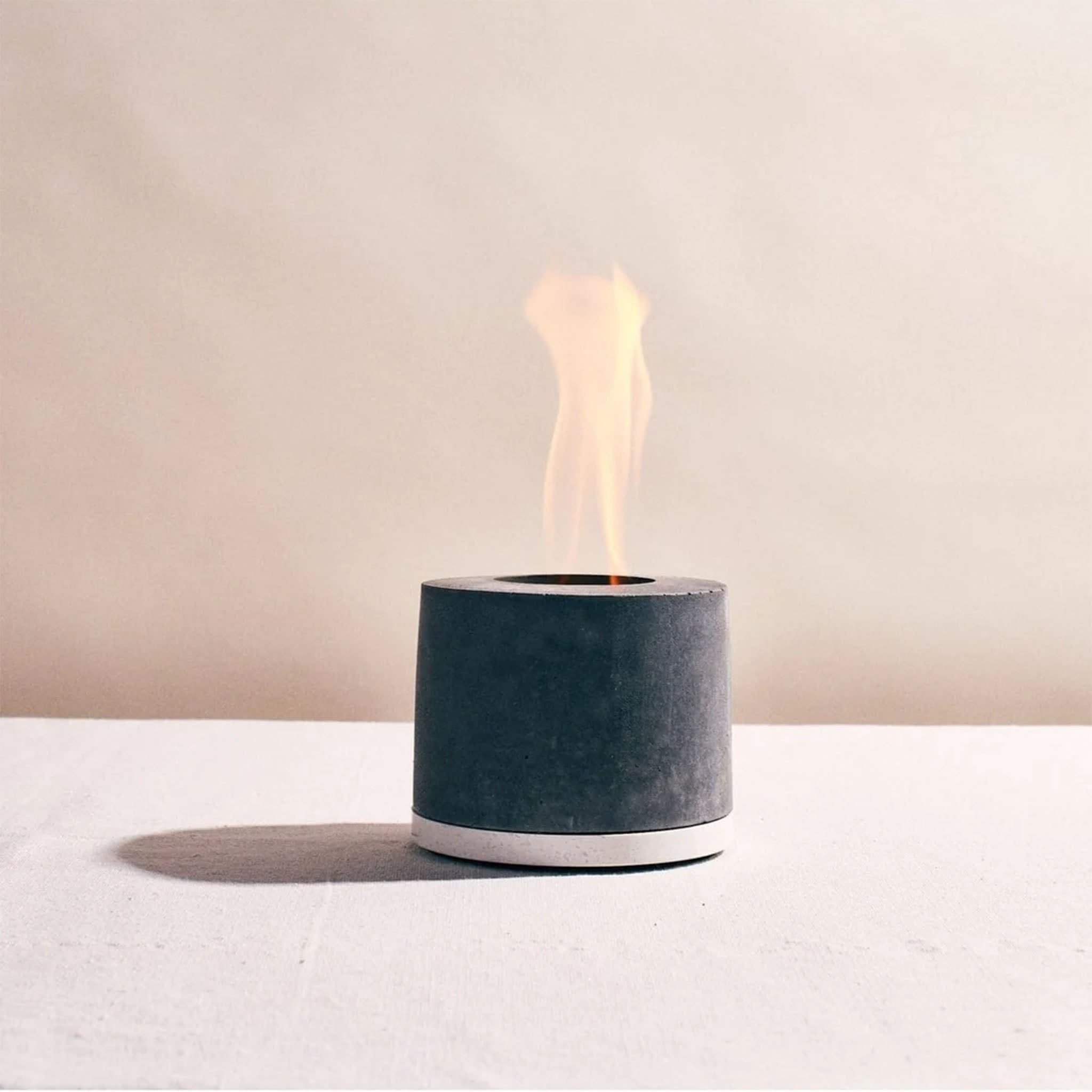 FLÎKR | Round Fire Concrete Fireplace