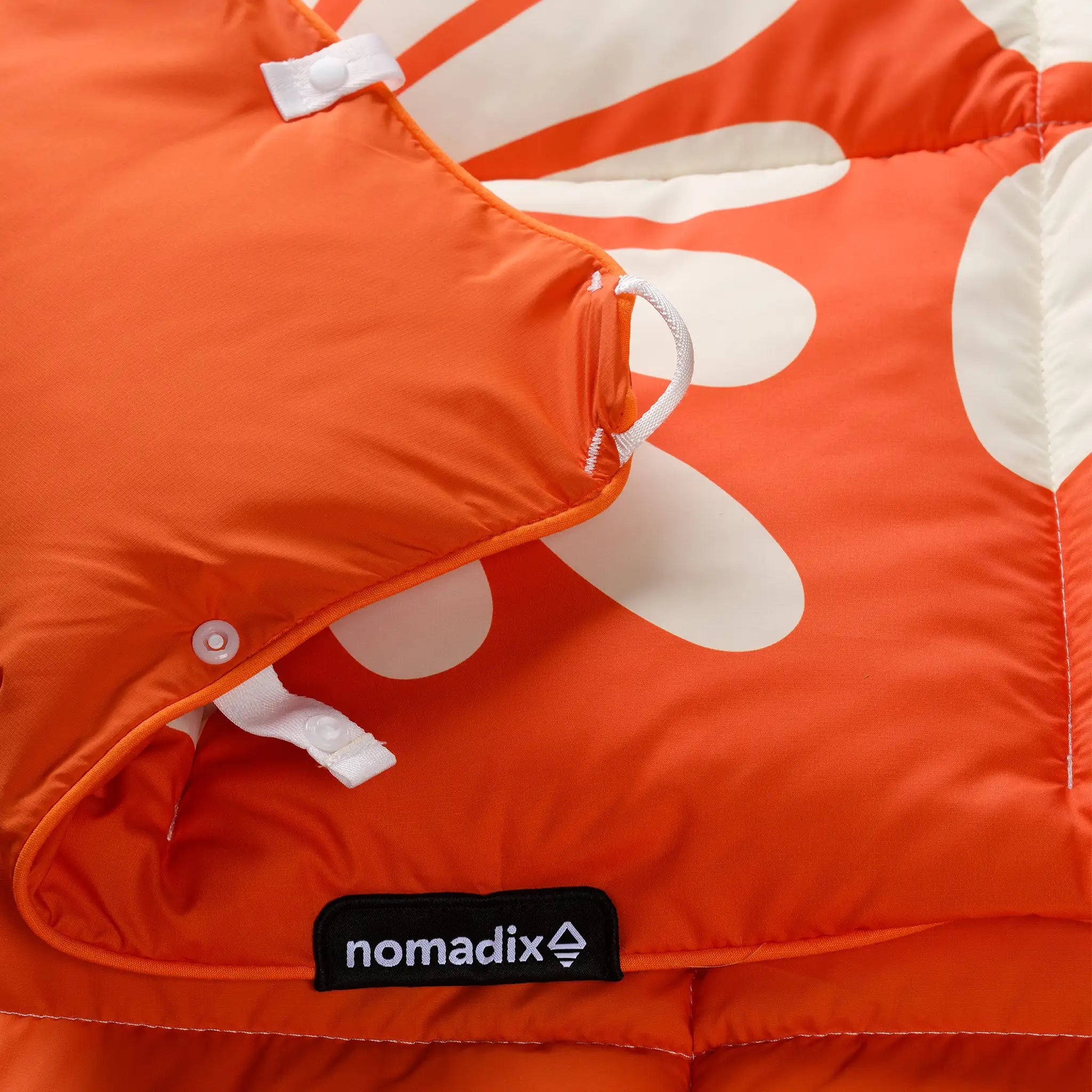 Nomadix | Graphene Puffer Blanket: Big Flowers Expedition Orange
