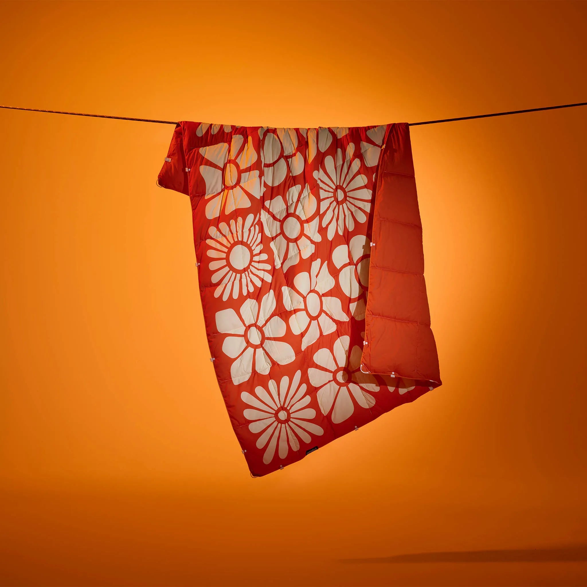 Nomadix | Graphene Puffer Blanket: Big Flowers Expedition Orange
